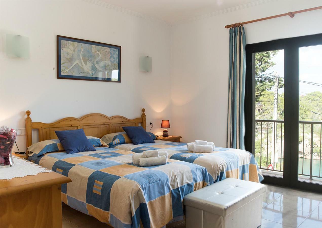 Apartamentos Vista Al Puerto Кала-Фігера Екстер'єр фото