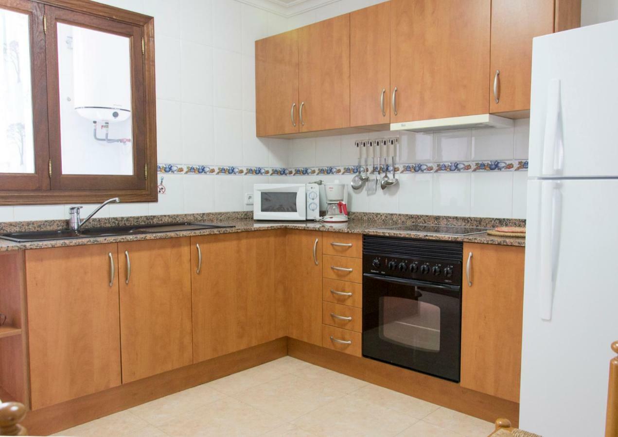 Apartamentos Vista Al Puerto Кала-Фігера Екстер'єр фото